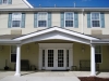 villa-raffaella-senior-living-photo-02-multifamily-exterior-2-front-entry-900x