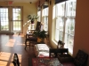 villa-raffaella-senior-living-photo-09-multifamily-interiors-5-porch-room-1-900x